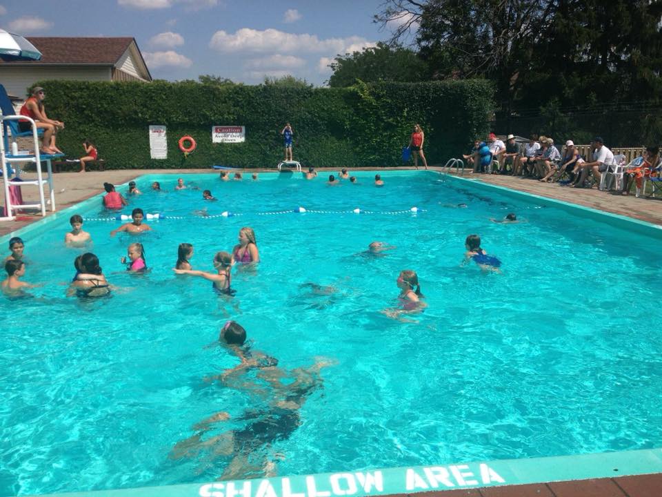 pool filled with people member based community pool