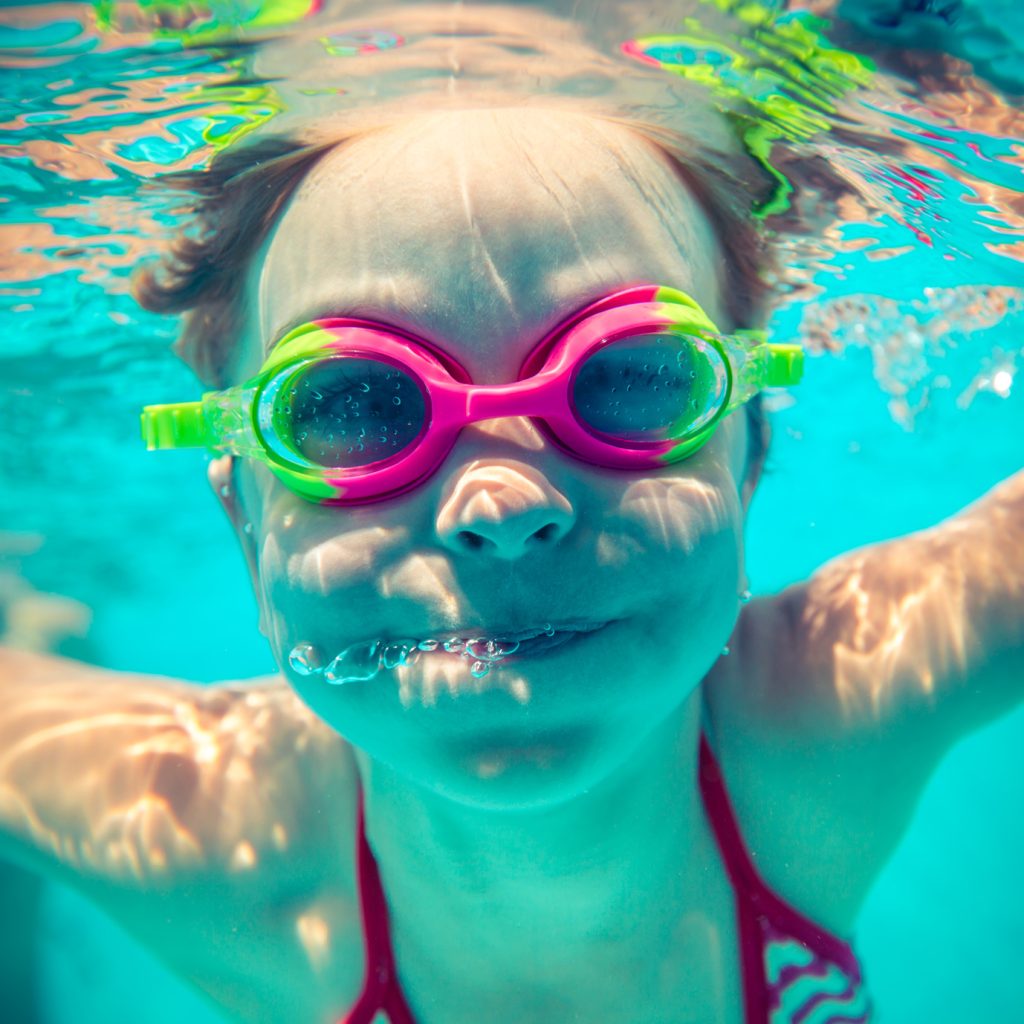 girl underwater in the pool - faqs page