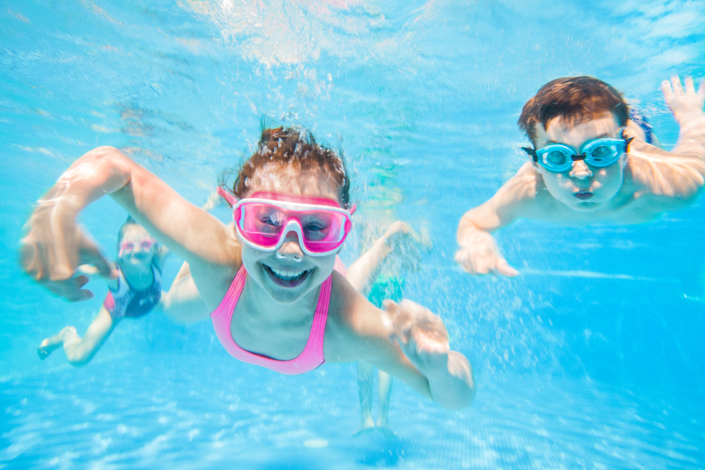 children swimming underwater