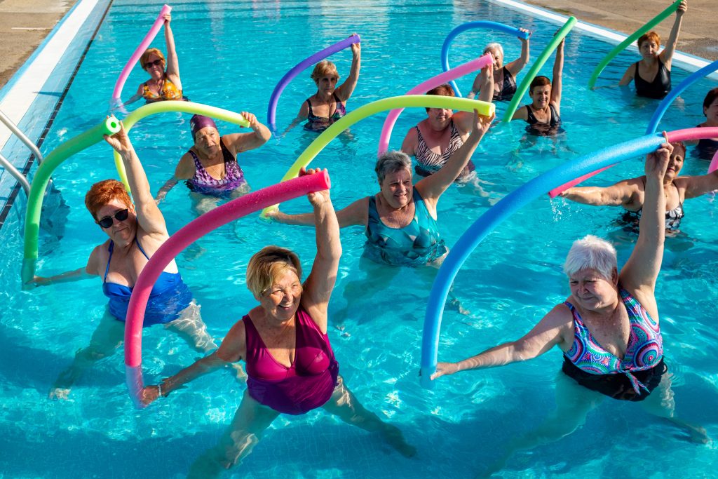 senior ladies doing aquafit at outdoor pool - aquafit and lane swim page